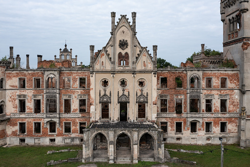 Abandoned  and ruined Palace In Kopice, Poland. Ruined castle in village Kopice, Opole Voivodeship aerial drone photo view