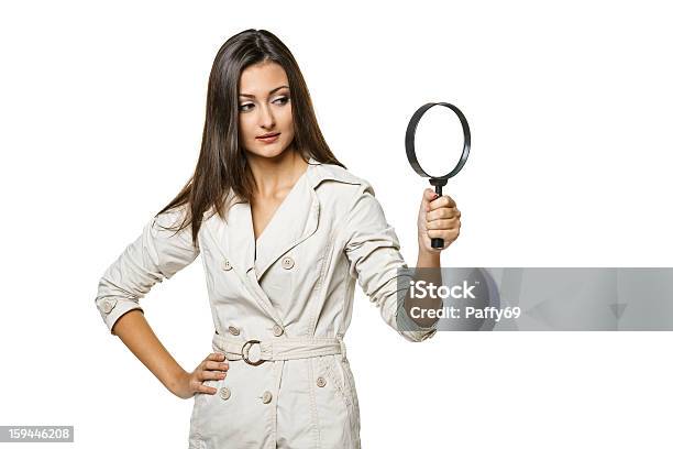 Female Looking Through Magnifying Glass At The Blank Copy Space Stock Photo - Download Image Now