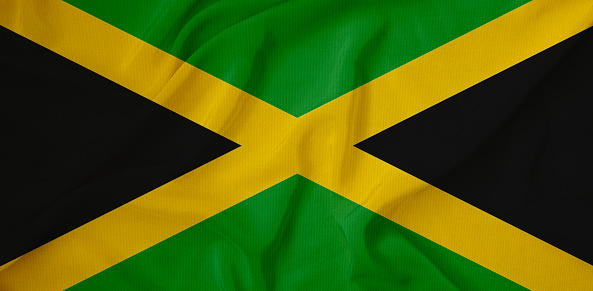 National flag of the Jamaica. The main symbol of an independent country. Flag of Jamaica. An attribute of the large size of a democratic state.2021