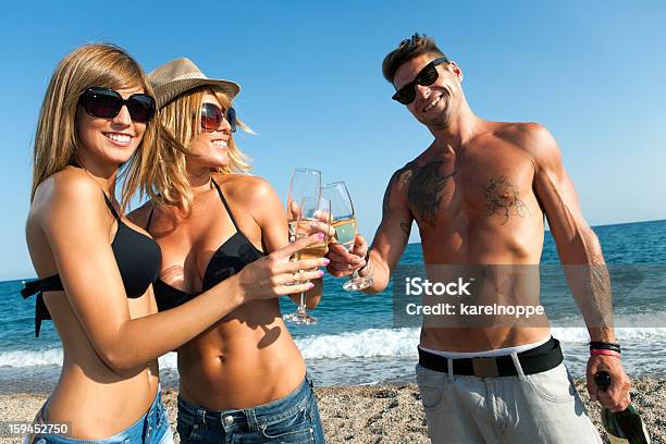 Tree Attractive Friends Making A Toast On The Beach Stock Photo - Download Image Now