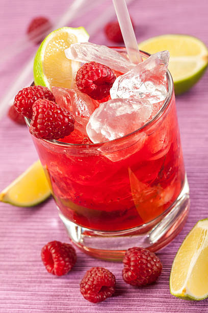 istock Red drink with raspberries and ice 159453566