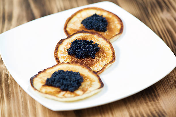 istock Pancakes with black caviar 159456958
