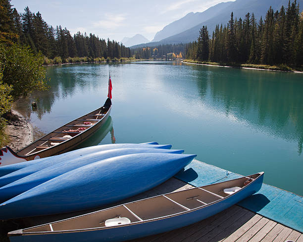 istock Canoes By the Bow River, Banff, Canada 159456959
