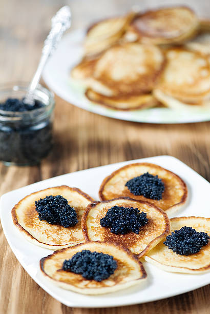 istock Pancakes with black caviar 159456987