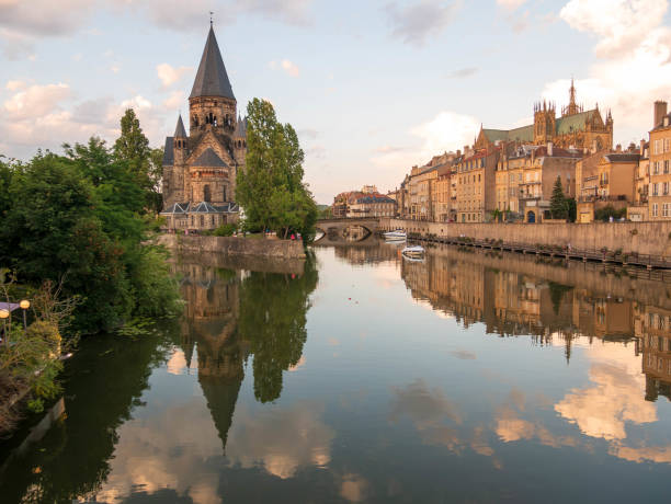 istock Landscape with river and buildings 1594581266