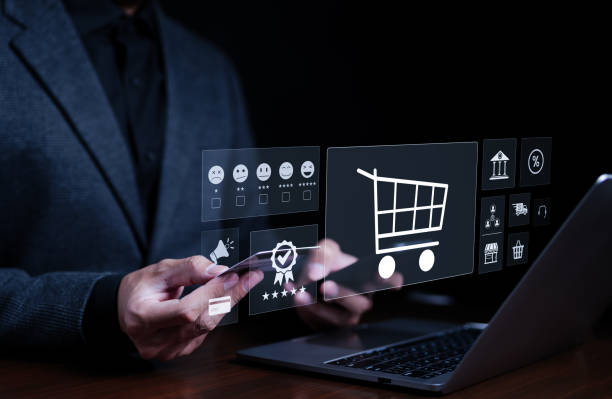 istock Payment and shopping online concept. Businessman using computer to enter purchase order into shopping cart and using mobile phone with credit card to pay online. Mobile banking, e-commerce technology. 1594627865