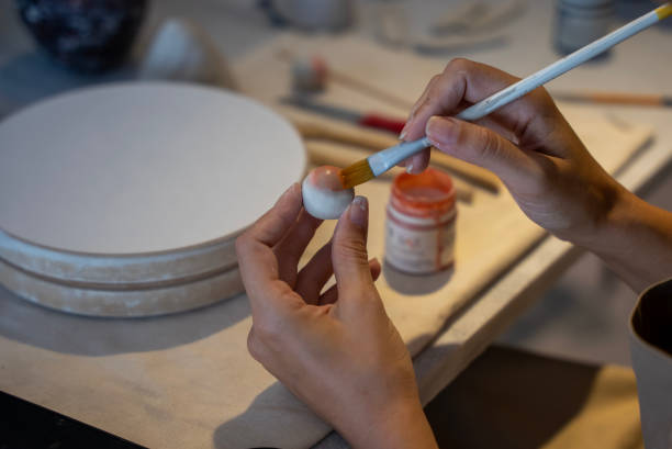 istock process of coloring ceramics in the workshop 1594650066