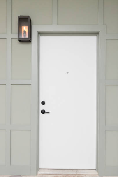 istock A front door with sage green wainscoting. 1594721269