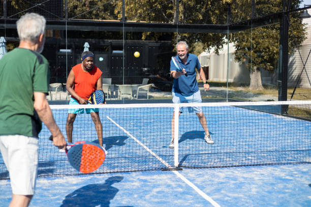istock Seniors on their weekend Paddle Tennis play 1595072159