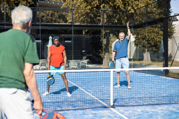 istock Seniors playing Paddle Tennis 1595072178