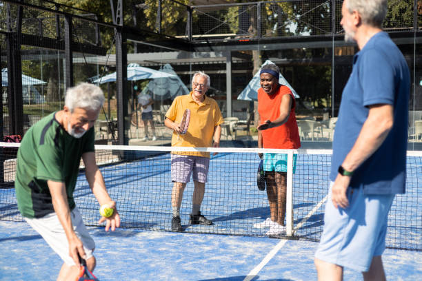 istock Senior men playing Paddle Tennis and arguing about the score 1595072684