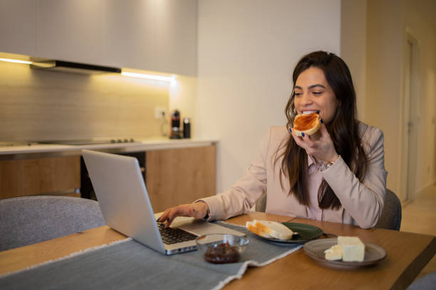 istock Young woman working from home 1595077368