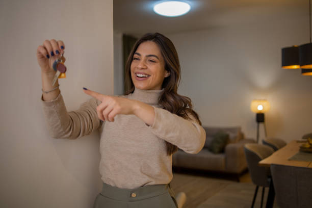 istock Woman moving into a new apartment 1595078569