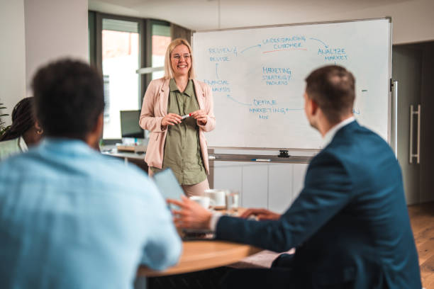 istock Motivating Mixed Race Group Through Leadership 1595126197