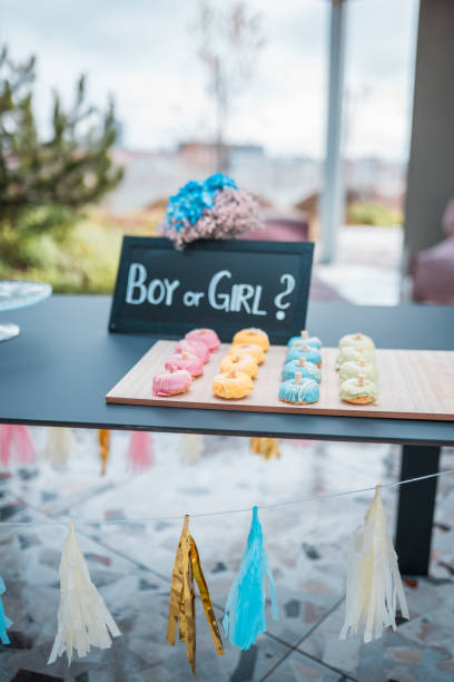 istock Small Glazed Donuts for a Gender Reveal Party 1595126929