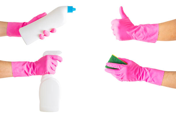 Cleaning accessories on gloved hands , isolated on white background