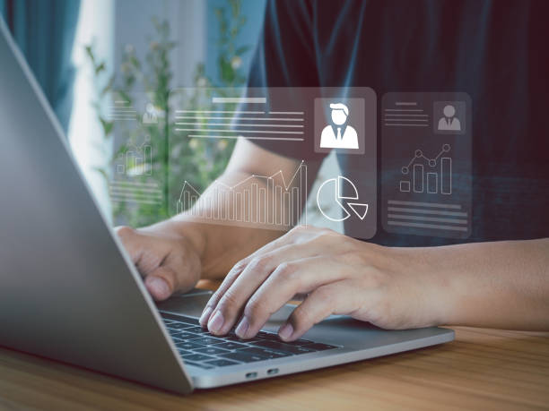 istock HR checks job applicants with electronic documents. 1595389481