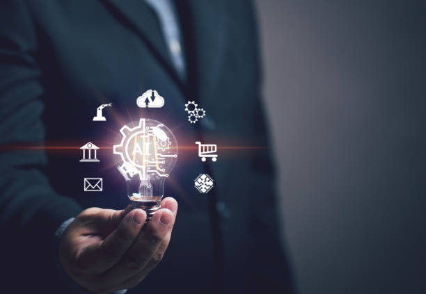istock Artificial Intelligence concept. Businessman showing ideas for the various functions that AI can do in each business. Whether it's document work, engineering, industry, online data. 1595401997