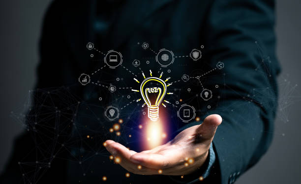 istock business idea concept. businessman using magnifying glass to search for ideas in work. brainstorming in corporate work with every filed like engineering, industry, education, online data. 1595402523