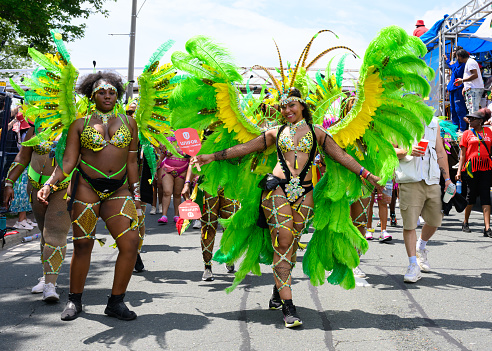 Toronto, Ontario, Canada - Aug 5, 2023: Toronto Caribbean Carnival has become the biggest of its kind in North America. The Grande Parade, as the highlight of the three-week Festival, attracts local, national, and international visitors.