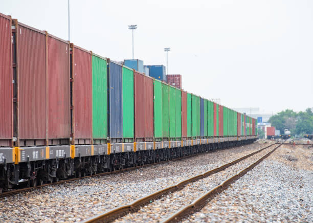 istock The freight container train is waiting to be loaded at the port. 1595495850