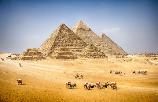 Great Pyramids of Giza and horse cart in Cairo Egypt