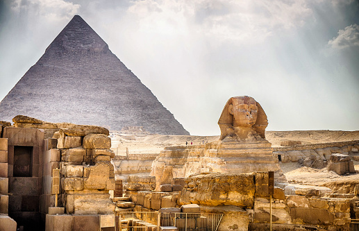 Sphinx and pyramids in the Giza necropolis.