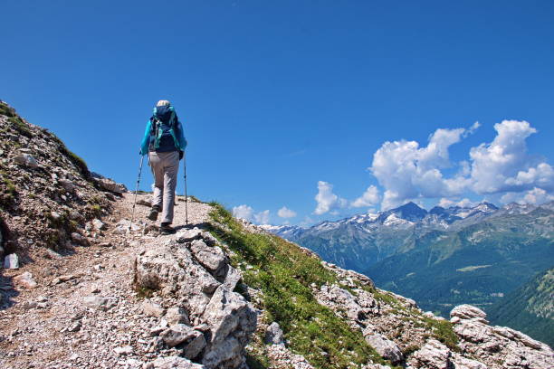 istock Senior woman hiking in Dolomites 1595596617
