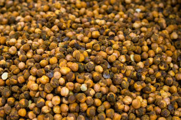 Close up of roasted chickpeas in a market in India.