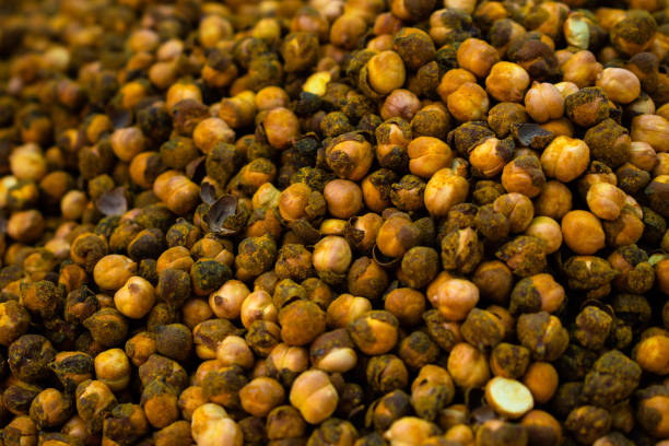Close up of roasted chickpeas in a market in India.
