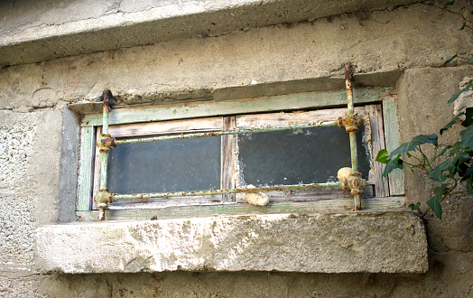 Medieval wooden door weathered in Hondarribia village, Gipuzkoa, Guipuzcoa at Basque Country of Spain, Euskadi