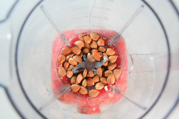 istock Almond nuts in the food processor view from above 1595790260