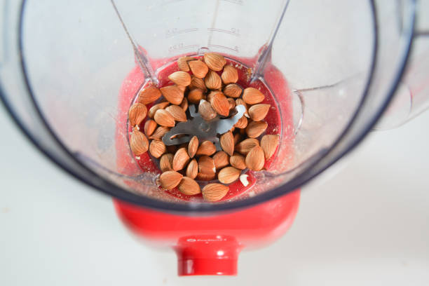 istock Almond nuts in the food processor view from above 1595790771