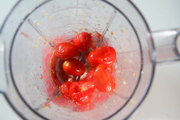 istock cherry tomatoes in the food processor view from above 1595791864