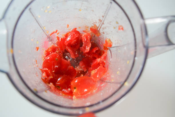 istock cherry tomatoes in the food processor view from above 1595791876