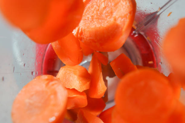 istock carrots in the food processor view from above 1595794002