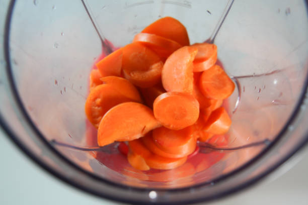 istock carrots in the food processor view from above 1595794007