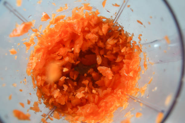 istock carrots in the food processor view from above 1595794531