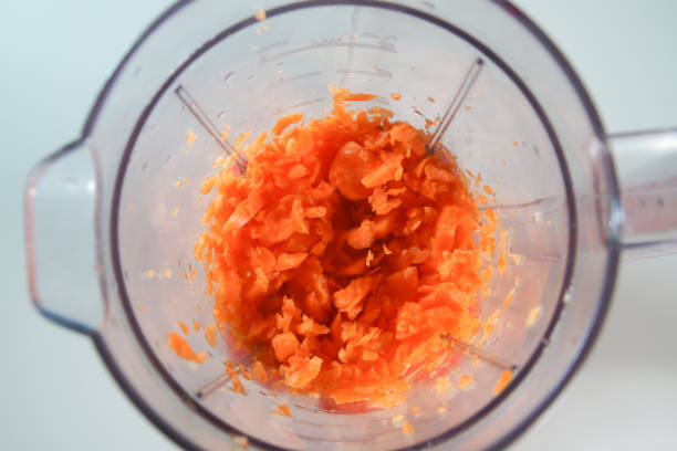 istock carrots in the food processor view from above 1595794539