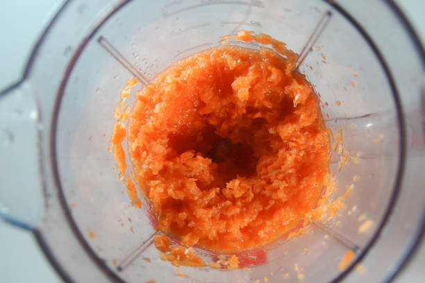 istock carrots in the food processor view from above 1595796653