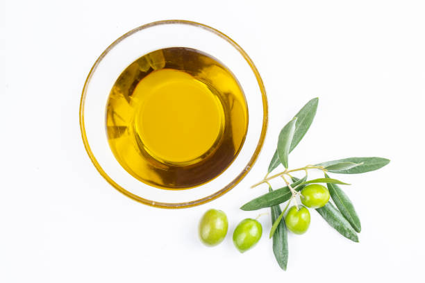 istock Green olive and olive oil 1595818742