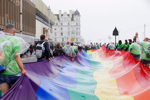 Brighton, England - August 5th 2023: The Brighton & Hove Pride Parade 2023 begins in wet and rainy conditions on August 05, 2023, in Brighton, England.