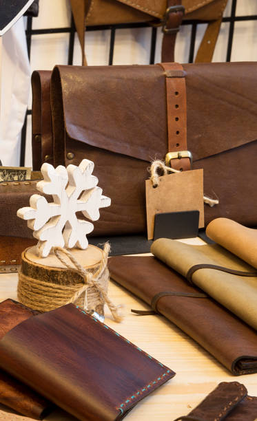 istock wooden case and leather products 1595832377