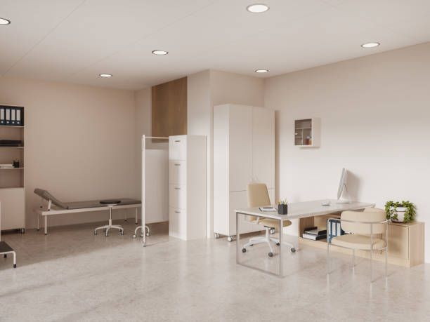 istock Stylish doctor's room interior medical bed and table with pc computer 1595877756