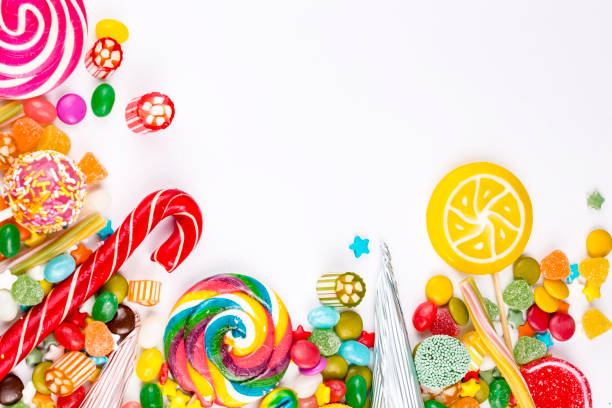 istock Colorful lollipops and different colored round candy. Top view. 1595884805