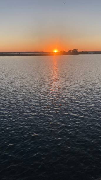 istock Bucolic sunset by the sea, tranquility relax wonderful vacations 1595886674