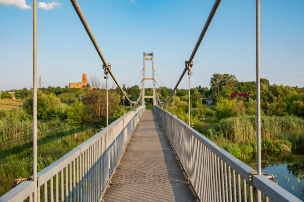 istock Modern metal suspension bridge 1595890603