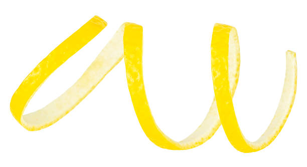 istock Fresh twisted lemon peel isolated on a white background, clipping path. Ripe lemon skin. 1595894906