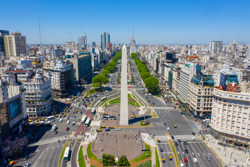 Obelisk landmark in Buenos Aires and green letters BA