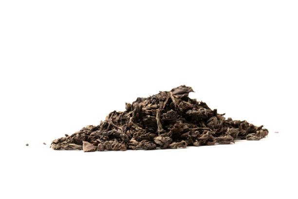 istock Dried tea leaves isolated on a white background. 1595914401